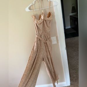 Kittenish floral print tan jumpsuit